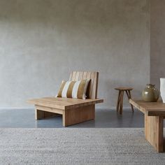 two pieces of furniture sitting on top of a carpeted floor next to each other