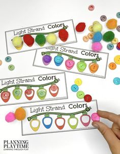 three handmade name tags with colored buttons on them, one for light strands and the other for bright strands