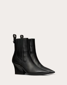 Valentino Garavani VLogo Lockette beatle boot in brushed calfskin - VLogo Signature twist-lock detail with tone-on-tone finish - Leather-covered Western-style block heel - Heel height: 75 mm / 3.0 in. - Boot shaft height: 22 cm / 8.7 in.; Italian size 37 - Made in Italy Beatle Boots, Studded Sneakers, Oxford Boots, Wedge Loafers, Pull On Boots, White Boots, Boot Accessories, Patent Leather Pumps, Boots And Sneakers