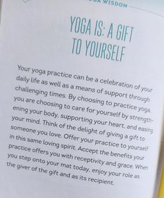 an open book with the words yoga is a gift to yourself