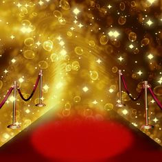 an image of a red carpet with gold stars