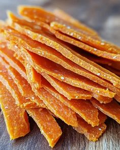 closeup of sliced orange peels on a cutting board