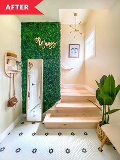 there is a green wall and stairs in this room with plants on the walls,