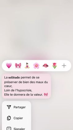 the text message is written in french and has pink flowers on it, along with other words