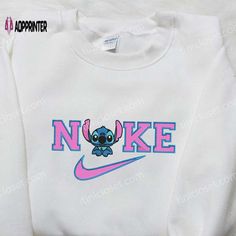 Introducing our adorable Baby Stitch x Nike Embroidered Sweatshirt, perfect for your little one’s wardrobe! Made with love and attention Nike Embroidered Sweatshirt, Lilo And Stitch Shirt, Baby Stitch, Nike Inspired, Crewneck Embroidery, Nike Crewneck, Cartoon Shirts, Cartoon Sweatshirts, Stitch Shirt