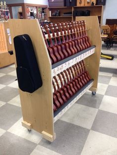 a display case with several rows of red and white chairs on it's sides