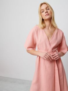 "MARY is a short sleeve, robe style linen wrap dress with a self tie belt. DETAILS - Self tie belt with no closure or belt loops - Dolman style sleeves - Knee length - 100% lightweight European linen fabric - Cut and sewn to order just for you in our studio COLOR - Pink Spanish, you can also choose other colors above - Fabric samples are available here https://www.etsy.com/listing/586569696/linen-fabric-samples SIZING & FIT - Relaxed fit - True to size - Model is 5'8\" / 173cm and wearing a size S CARE FOR LINEN - Machine wash up to 30ºC/86ºF gentle cycle - Lay flat to dry or tumble dry low - Warm iron if needed - Do not bleach SIZE GUIDE Size conversion guide Size XS (US 0-2, IT 36-38, UK 4-6, Japan 3-5, France 32-34) Size S (US 4-6, IT 40-42, UK 8-10, Japan 7-9, France 36-38) Size M (US Belted Linen Wrap Dress, Linen Wrap Dress With Belt, Spring Linen Wrap Dress, Belted Short Sleeve Wrap Dress For Beach, Short Sleeve Belted Wrap Dress For Beach, Belted Wrap Dress With Short Sleeves For Beach, Short Sleeve Wrap Dress With Tie Waist For Brunch, Spring Linen Belted Dress, Belted Short Sleeve Wrap Dress For Brunch