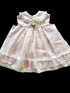 This is a beautiful vintage Pink polka-dot baby dress with pink frills, Bryan sz for 18 Mo. Four button closure on the back. This dress would be perfect for Easter, Church, or a picnic in the park. Anytime you want to show off your beautiful baby would be a time to wear this wonderful item. *email me if you need measurements. Cute Ruffled Collar Dress For Dress-up Occasions, Cute Dress With Ruffled Collar For Dress-up, Cute Dress With Ruffled Collar For Dress-up Occasions, Cute Dress-up Dress With Ruffled Collar, Cute Ruffled Vintage Dress For Garden Party, Cute Vintage Ruffle Dress For Garden Party, Cute Vintage Dress With Ruffles For Garden Party, Summer Vintage Dress With Ruffles For Dress-up, Vintage Dress With Doll Collar For Dress-up