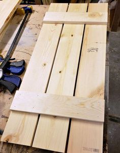 some wood planks are laying on top of each other and ready to be cut into pieces