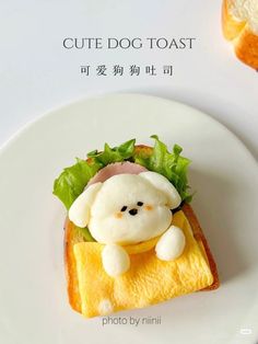 a white plate topped with an animal sandwich