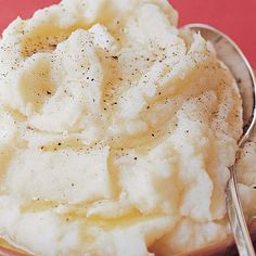 mashed potatoes in a bowl with a spoon