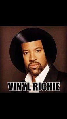 a man in a black suit and hat with the words vinyl richie on it