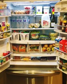 an open refrigerator filled with lots of food