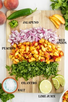 the ingredients to make mango salsa on a cutting board