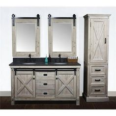 a bathroom vanity with two mirrors above it