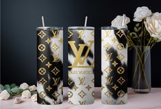 three louis vuitton vases sitting next to each other with flowers in the background