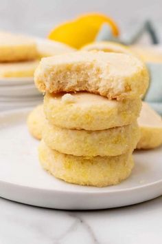 three lemon cookies stacked on top of each other