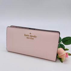 Brand New With Tag Kate Spade Staci Large Slim Bifold Wallet Color: Light Rose Details Saffiano Leather Two Way Spade Jacquard Lining Snap Closure 12 Credit Card Slots Id Window 4 Slip Pockets Zip Compartment On Back Of Wallet Approx. Measurements: 3.5"H X 6.7"W Pink Leather Wallet With Rfid Blocking, Classic Pink Leather Wallet, Elegant Pink Wallets With Rfid Blocking, Pink Feminine Wallet For Everyday Use, Feminine Pink Wallet For Everyday Use, Feminine Pink Wallets For Daily Use, Formal Pink Wallets With Interior Card Slots, Chic Compact Pink Wallet, Pink Feminine Wallet For Everyday