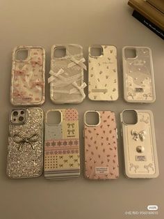 six iphone cases with bows and sequins on them