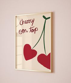 there is a sign on the wall that says cherry em top and two red hearts