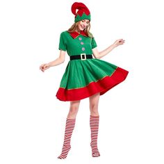 a woman in a green and red christmas costume