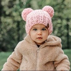 Our chunky double pompom hat knitting pattern is perfect for making handmade gifts for your loved ones, young and old.\n\nSizes: Newborn, 0-3 Months, 3-6 Months, 6-12 Months, 1-3 Years, 4-12 Years, Women\n\nYarn: Lion Brand - Wool Ease Thick & Quick (#6 weight Knitting Kids, Xmas Crochet, Dog Beanie, Chunky Babies, Knitting Hats, Chunky Hat, Lion Brand Wool Ease, Hat Knitting Pattern, Messy Bun Hat