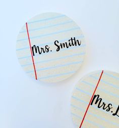 two personalized coasters on top of each other with the word mr and mrs printed on them