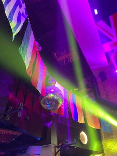 disco ball and flags hanging from the ceiling