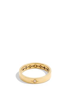 a gold ring with diamonds on it