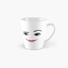 a white cup with a face drawn on it