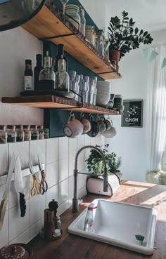 the kitchen counter is clean and ready to be used for cooking or cleaning up some dishes