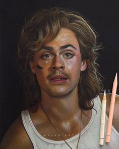 a painting of a man with makeup on his face next to a pencil and eraser