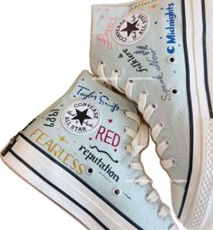 the converse sneakers are painted with different colors