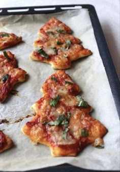 small pieces of pizza on a baking sheet