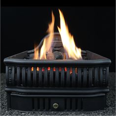 a close up of a fire pit with flames