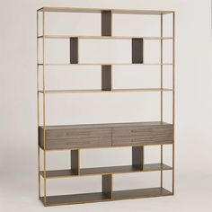 a book shelf with two drawers and shelves on each side, in gold metal frame