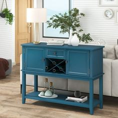 a living room scene with focus on the sideboard and wine bottle rack in the center