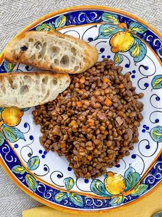 there is a plate with bread and beans on it