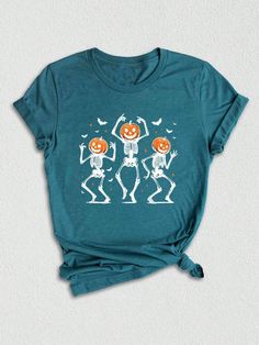 Get into the spooky spirit with our Halloween-themed t-shirts! Whether you're looking for a cute fall shirt or a retro vintage design, we have something for everyone. From dancing skeletons to pumpkin heads, our collection has the perfect tee for the spooky season. Treat yourself or surprise a friend with a fun Halloween gift that's sure to be a hit at any Halloween party. Don't miss out on our trick or treat and fright night shirts to complete your Halloween wardrobe! Get into the spooky spirit Funny Halloween Short Sleeve Shirt, Vintage Halloween Designs, Spooky Custom Print T-shirt For Fall, Cheap Spooky Shirt With Funny Print, Casual Halloween T-shirt With Funny Print, Spooky Relaxed Fit T-shirt With Funny Print, Pumpkin Shirt, Night Shirt, Retro Halloween