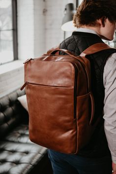 The Manhattan Features: 100% Premium Full Grain Oil Waxed leather Durable canvas interior High quality YKK zippers Adjustable Straps 3 Main zippered compartments Discreet back pocket (for cash or phone storage) Laptop sleeve fits up to a 16” laptop #mensbackpack #leatherbackpack #mensleatherbag Modern Luggage With Laptop Sleeve For Travel, Modern Travel Luggage With Laptop Sleeve, Laptop Backpack With Luggage Sleeve For Commuting, Commuting Laptop Backpack With Luggage Sleeve, Classic Everyday Backpack Luggage, Classic Travel Bag Standard Backpack, Leather Backpack With Laptop Sleeve For Travel, Leather Travel Backpack With Laptop Sleeve, Modern Backpack With Luggage Sleeve For On-the-go