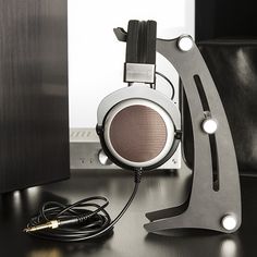 a pair of headphones sitting on top of a desk