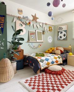 a child's bedroom with soccer themed decor