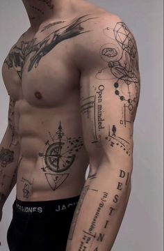 an image of a man with tattoos on his arm and chest, looking at the camera