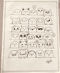 a drawing of many different faces on a shelf