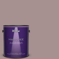 a purple paint can with the words marquee on it's bottom half