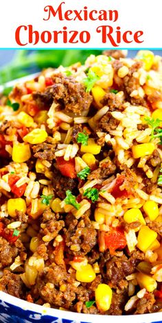 mexican chorizo rice in a blue and white bowl with corn on the side