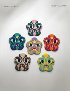 six embroidered patches with different colors and designs on them, each featuring an animal's face