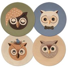 four owl coasters with different designs and colors on the front, one has a bow tie