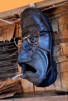 an old shoe with glasses on top of it