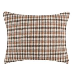 a brown and white plaid pillow on a white background